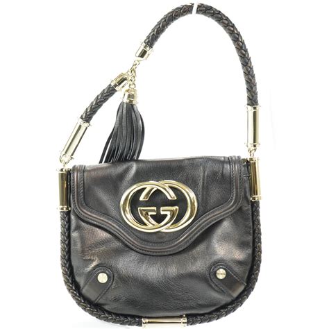 black gucci bag with tassel|Gucci leather shoulder bag.